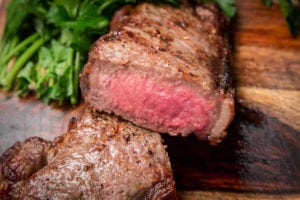 Broiled strip steaks